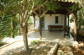 House with garden ON beach